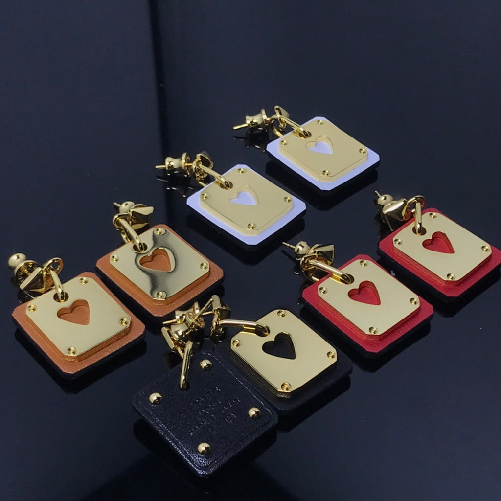 18K Hermes As De Celine Black Earrings