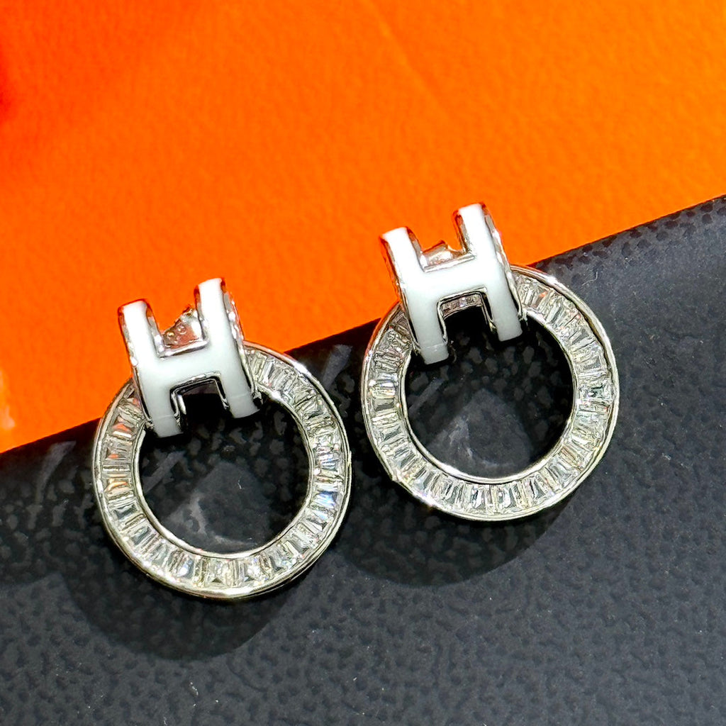 18K Hermes Clic Diamond Earrings