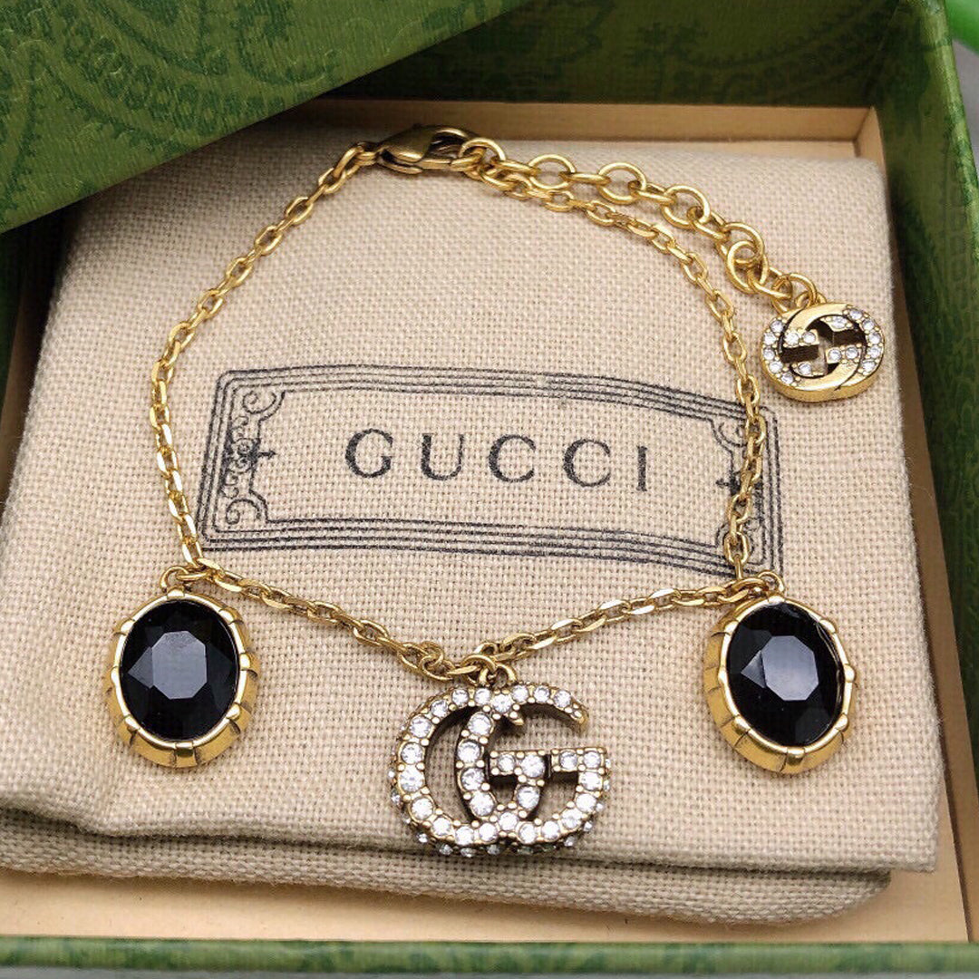 18K Gucci Double Black Stones Bracelet