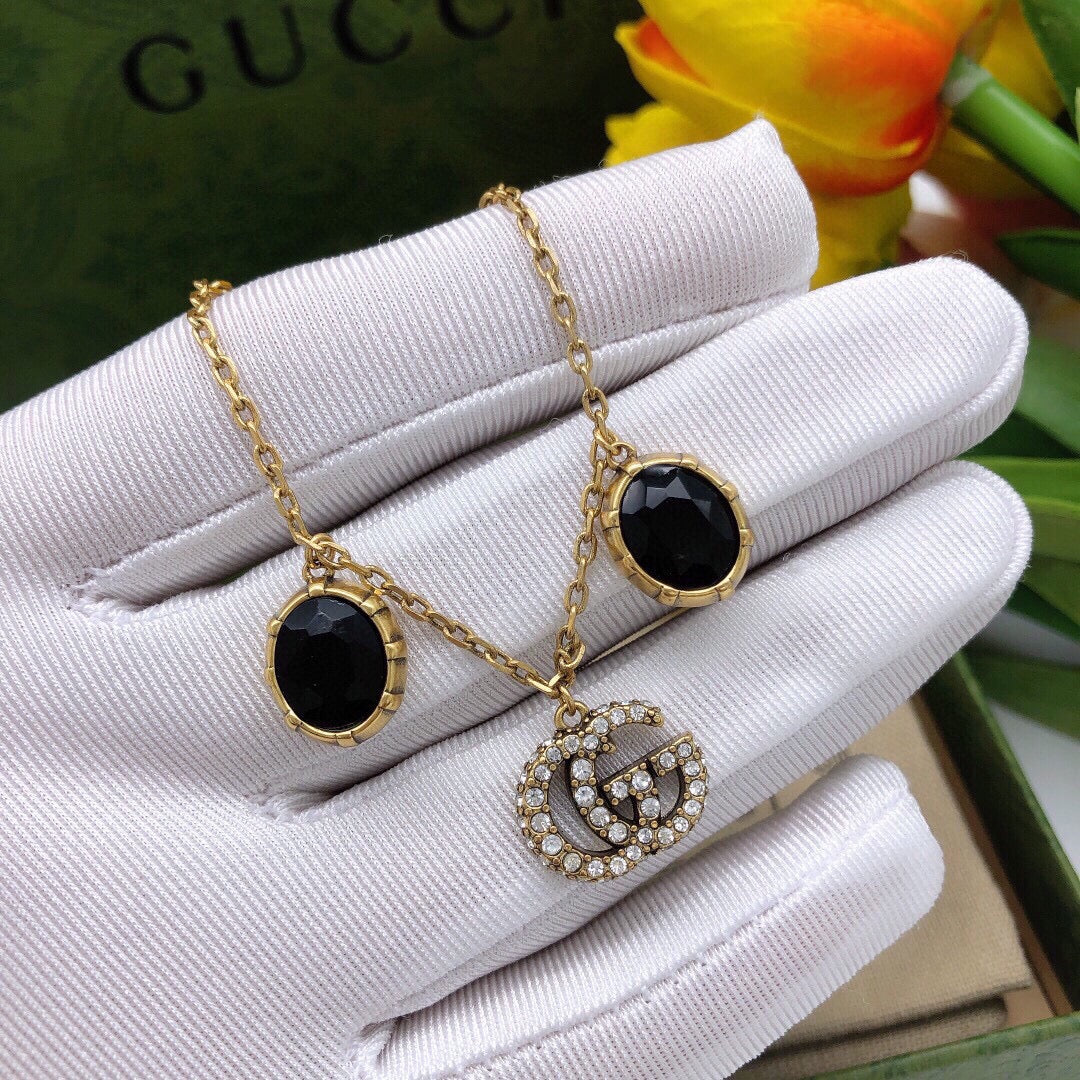 18K Gucci Double Black Stones Bracelet