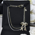 18K Chanel 25K Bow Tie Diamond Gold Necklace