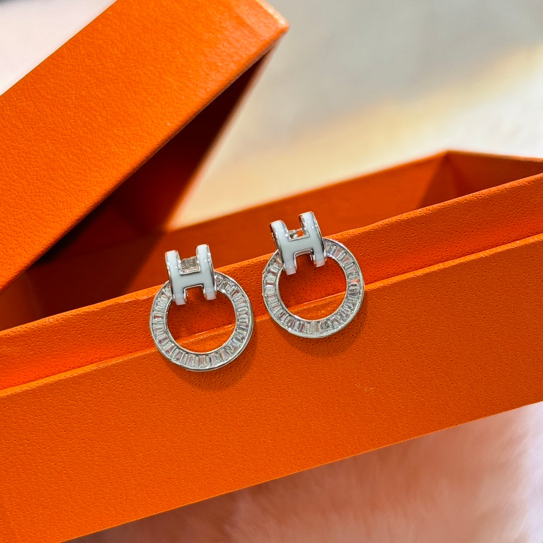 18K Hermes Clic Diamond Earrings