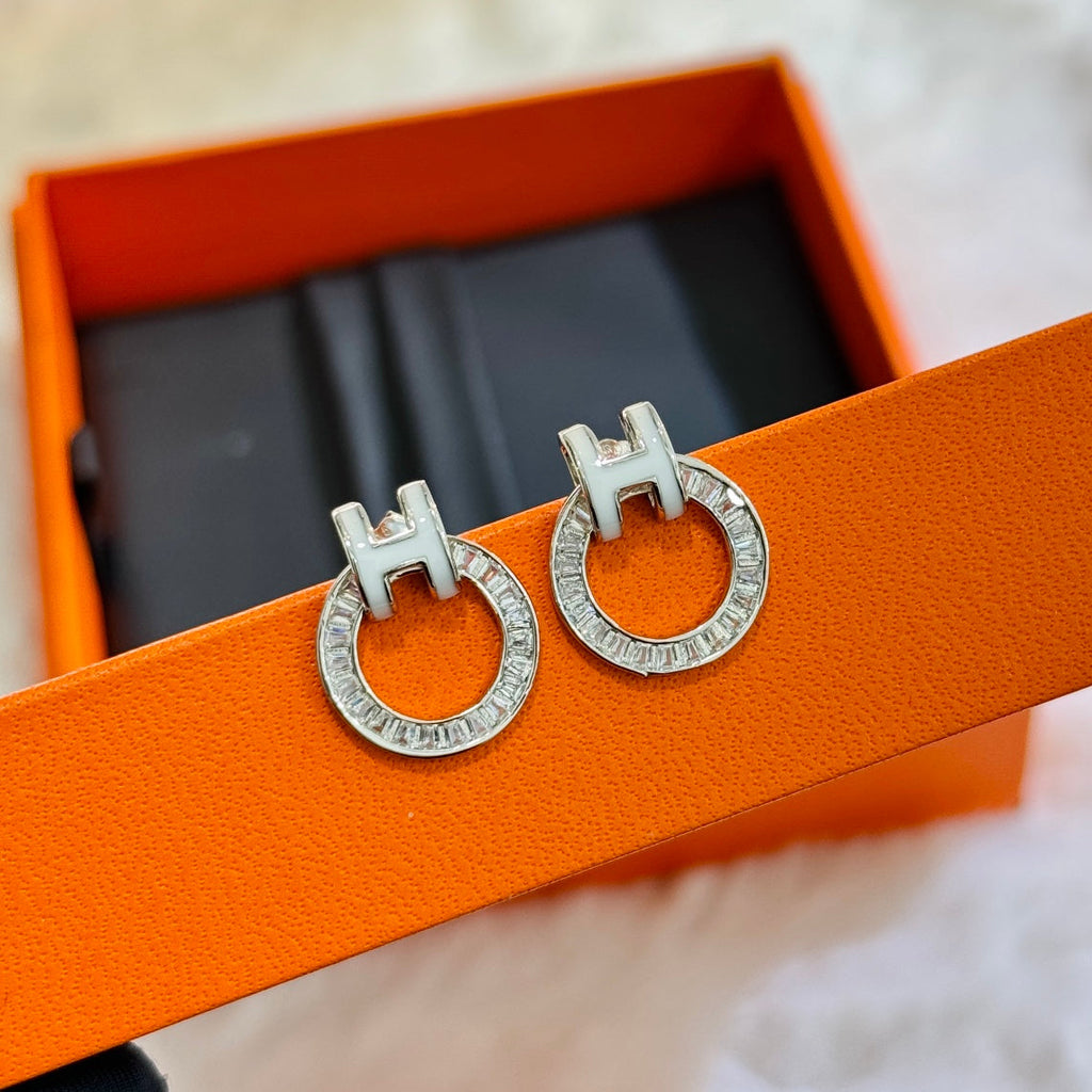 18K Hermes Clic Diamond Earrings
