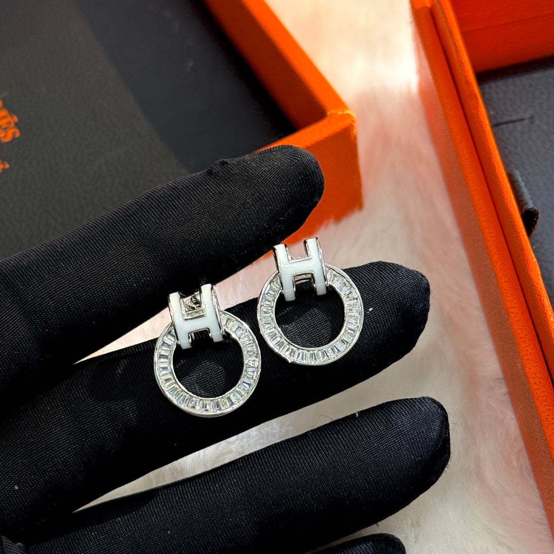 18K Hermes Clic Diamond Earrings